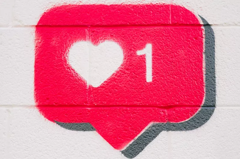 A red chat bubble depicting a like.